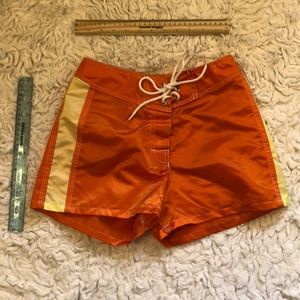 Orange Shorts with yellow stripe